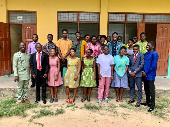 Fosco Chapter large group photo on campus steps